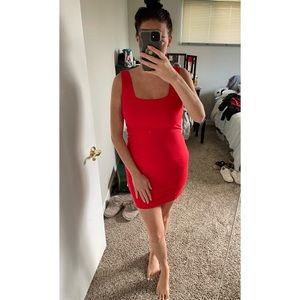 Red body con dress